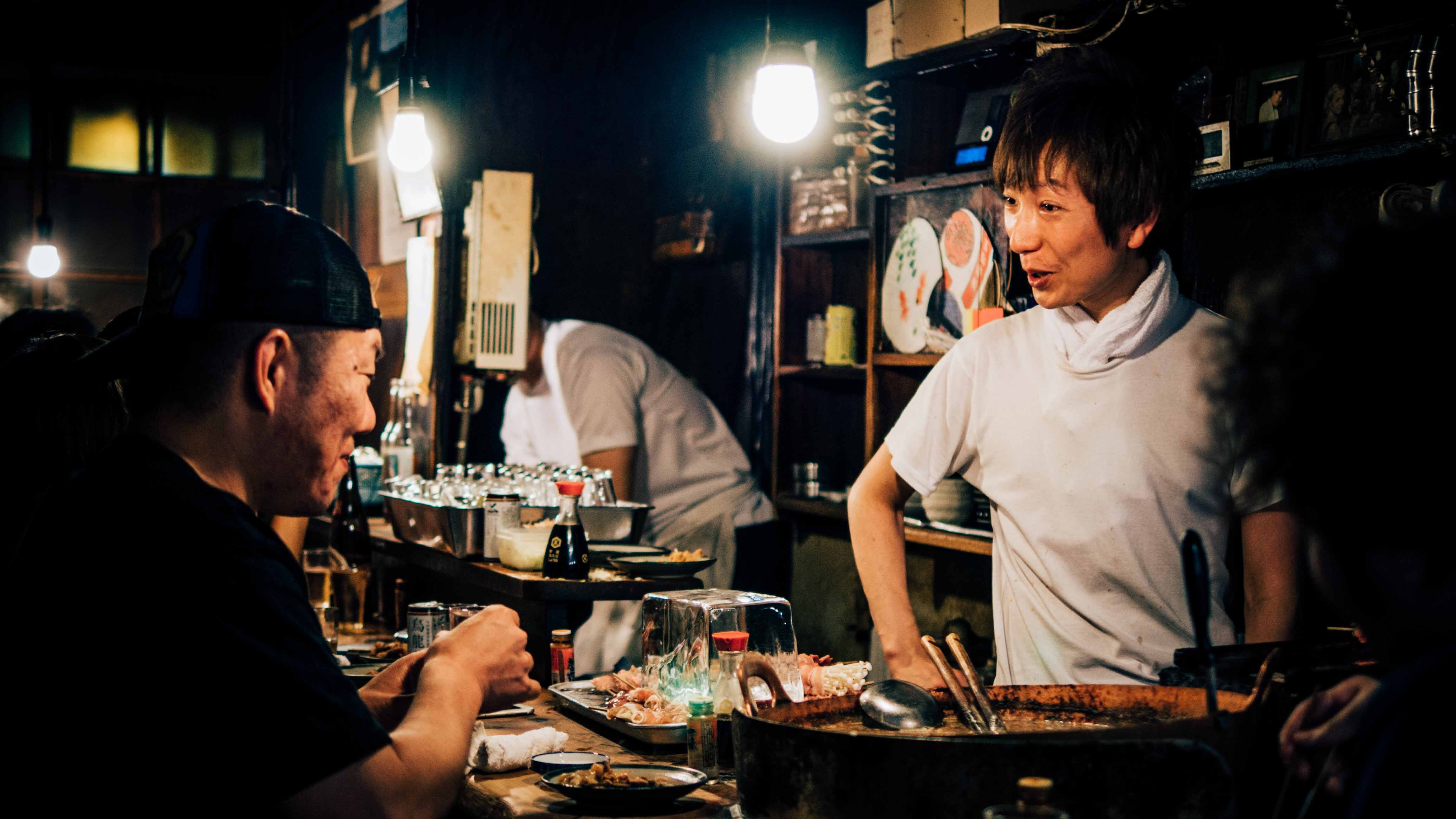 Japanese izakaya chef and diner