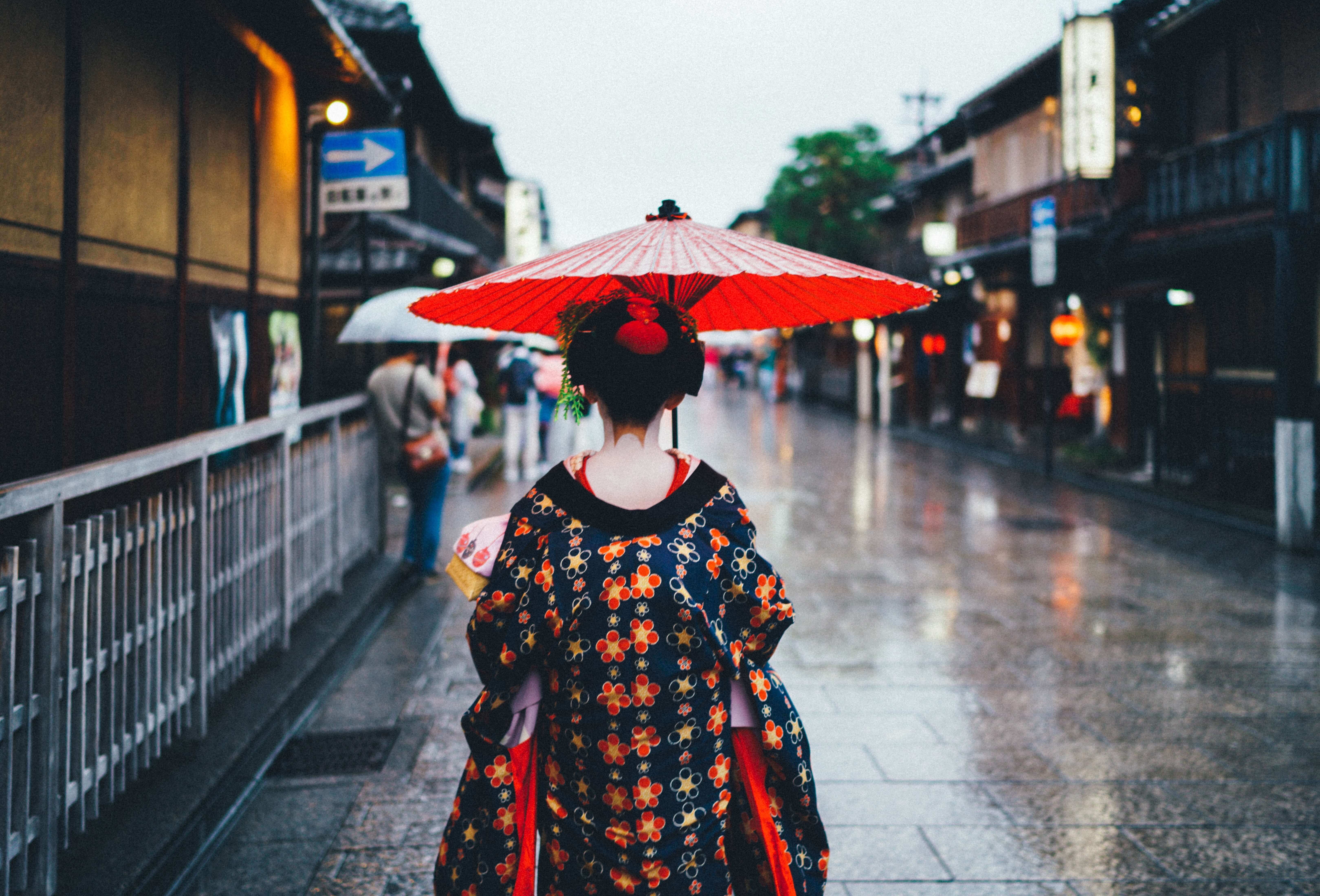 Geisha Maiko in colorful kimono in Gion district of Kyoto, Japan