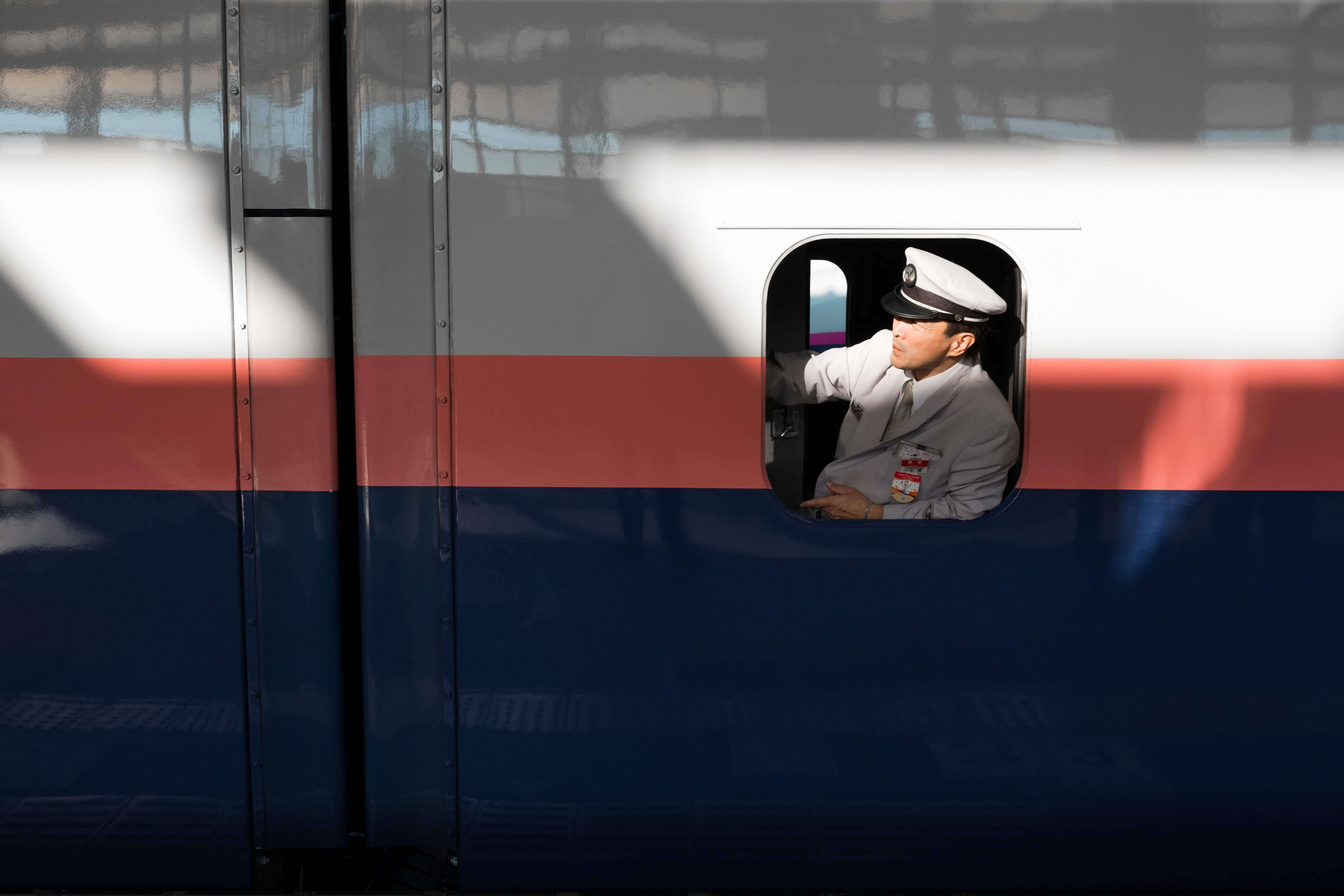 Shinkansen bullet train conductor Japan