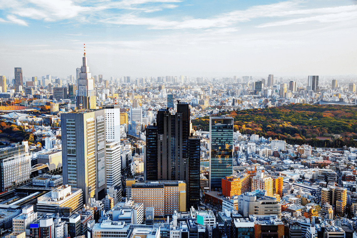 Shinjuku skyline with autumn colors in Shinjuku-gyoen garden, Tokyo, Japan