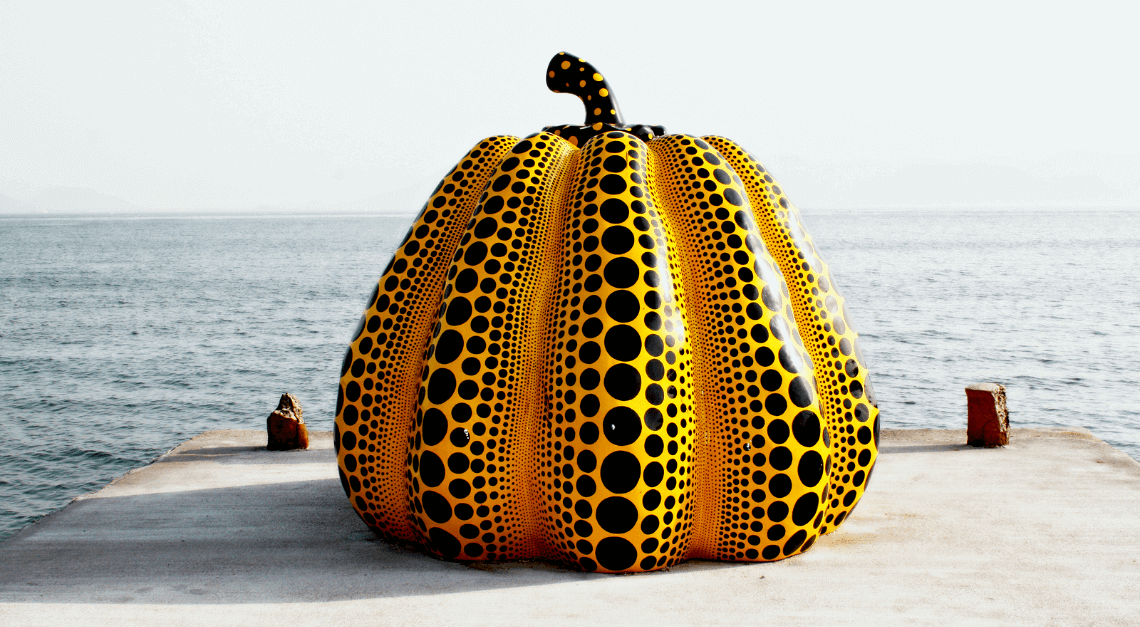Pumpkin sculpture by artist Yayoi Kusama at Benesse House, on Naoshima Island, Japan